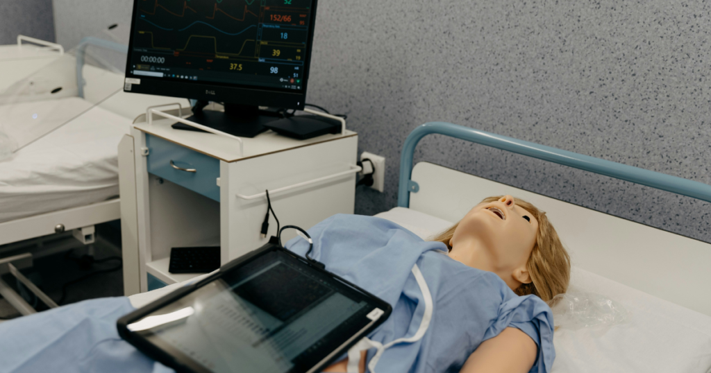 a patient lying on a bed while an X-ray machine scans their body above them.